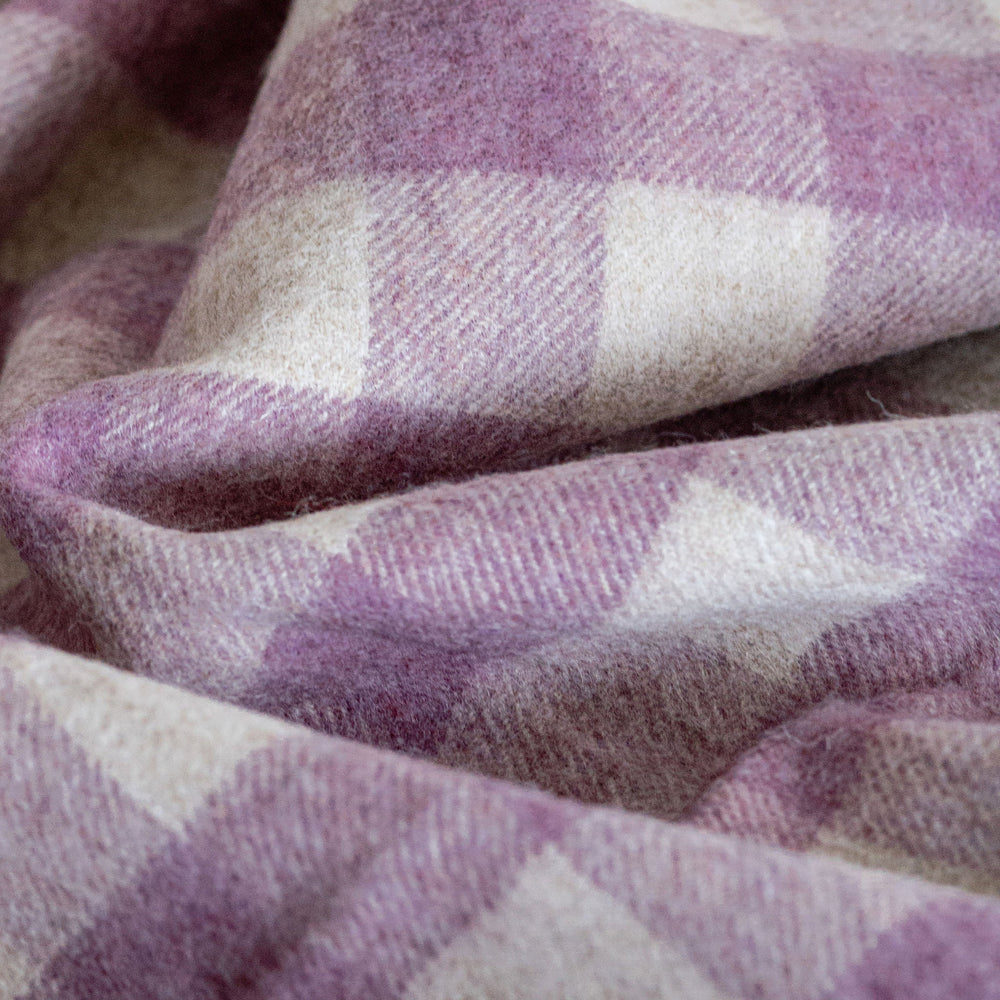 Close-up of a purple and white checkered fabric texture