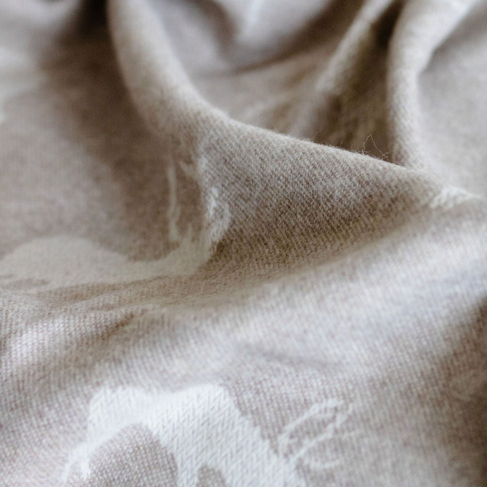 Close-up of beige fabric with visible texture