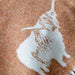 Textured fabric with a white bird silhouette print