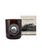 An amber glass scented candle in a cylindrical jar with a white circular label, standing next to its cream-colored product box featuring black botanical illustrations. The brand 'The Grampians Goods Co' is clearly visible on both the jar label and the box.