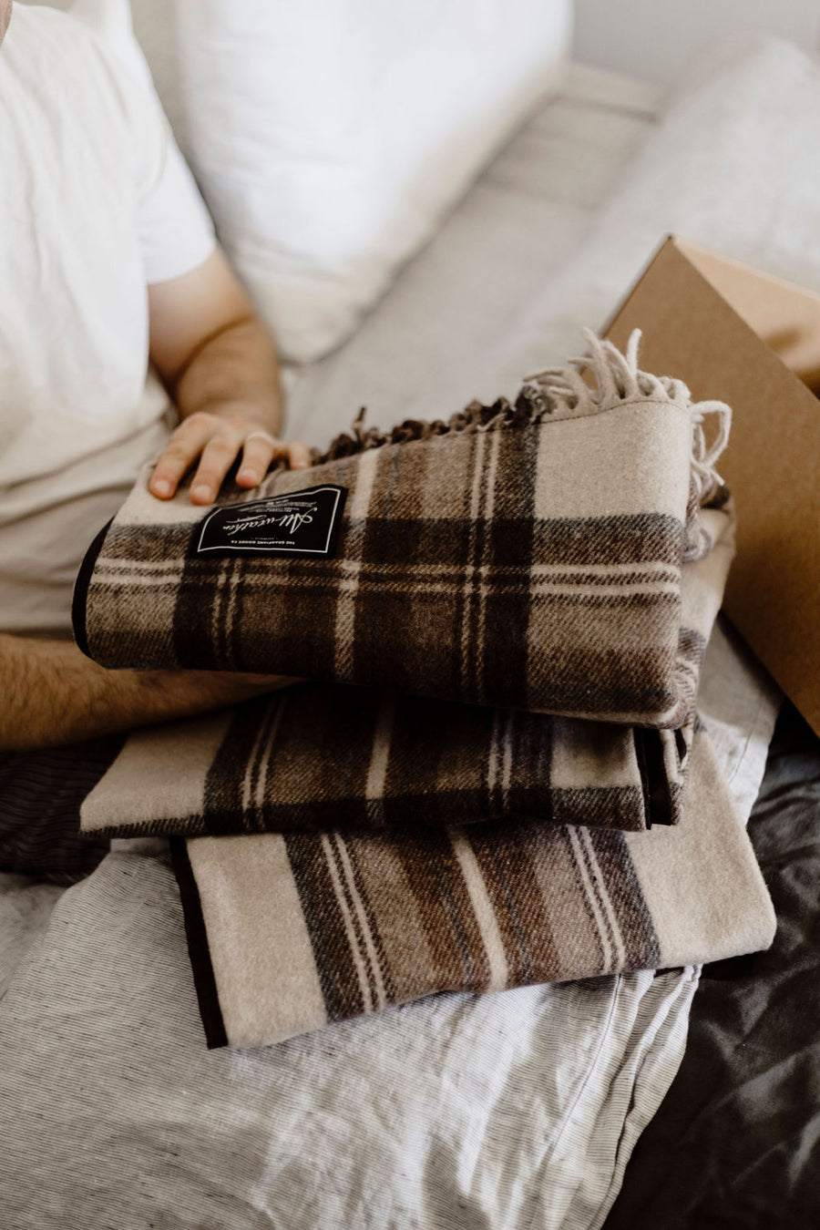 Father's Day 2026 - stacked folded tartan blankets